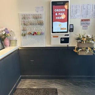 You can use the kiosk or order at the counter