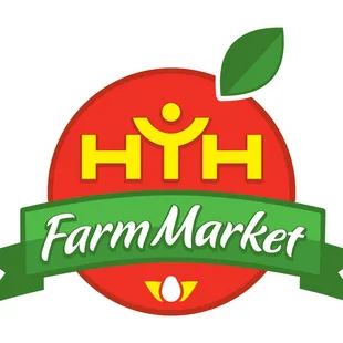 a red apple with a green ribbon around it