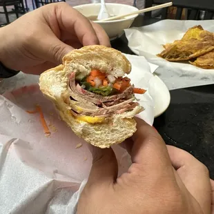 Half of the cold cut bánh mì