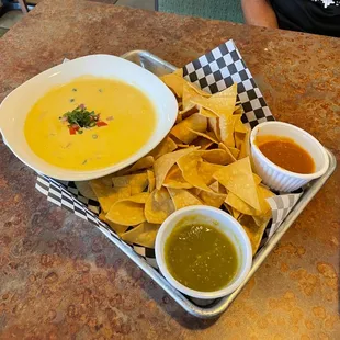 Chips and Queso with salsa..ask for the red.