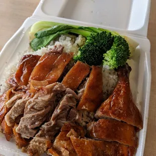 a meal in a styrofoam container