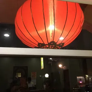 Authentic Chinese restaurant with a big red lantern outside