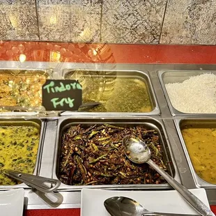 Thursday evening buffet: potato and eggplant curry, Yellow Dal Spinash, rasam, tindora (gourd) fry, rice, sambar