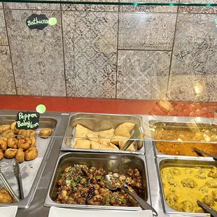 Thursday evening buffet: Vada, Bhatura, Baby Corn Manchurian, Paneer Butter Masala, kadi pakodi (fritters in yogurt curry)