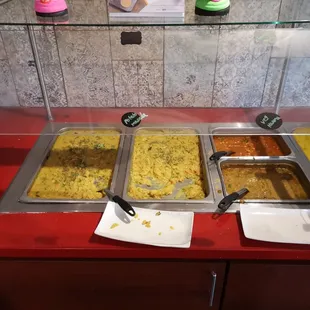 Potato curry , chana masala (garbanzo bean curry) , kurma ( veg curry in coconut gravy )