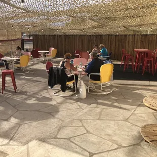 Folks enjoying the open spaced patio