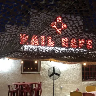 Patio now under 40x40 camo drape for shade and privacy. Misters and fans added too