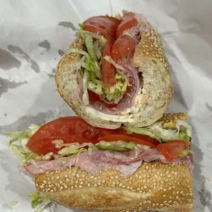 The Sicilian Hoagie - Genoa salami, capicola, prosciutto, ham, sharp provolone, basil &amp; roasted red pepper. Solid, great roll