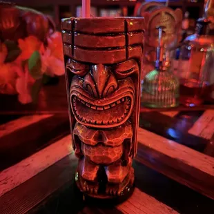 a tiki on a bar table