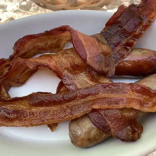 Bacon and sausage served family style.