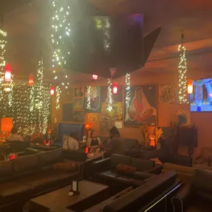a bar with christmas lights