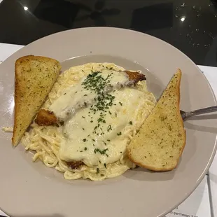 chicken parm with alfredo sauce and Garlic Bread