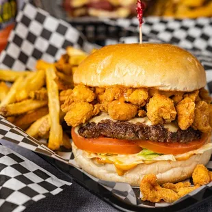 a burger and fries in a basket