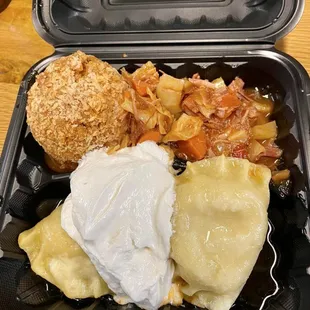 a meal in a styrofoam container