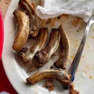 Dried out rib bones with white patches I believe this indicates that the ribs were reheated, not freshly made!