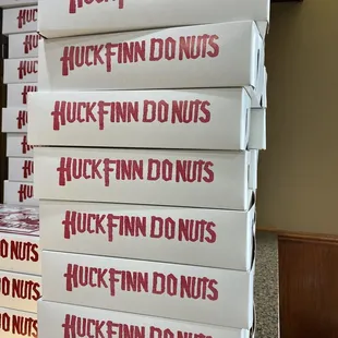 a stack of pizza boxes