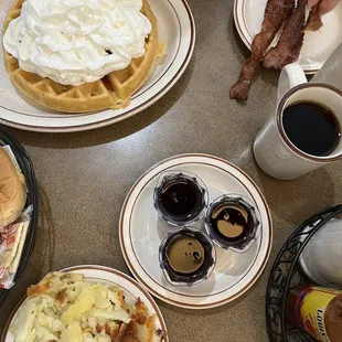 waffles, eggs, bacon and coffee