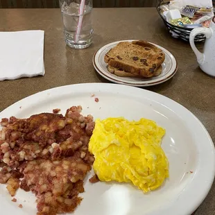 Corned Beef Hash, with scrambled eggs, Raisin toast and coffee.