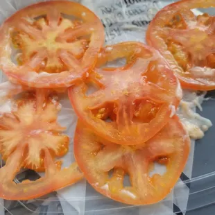 Raw tomatoes the restaurant claimed were lightly grilled.
