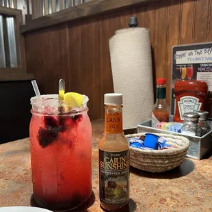 Huckleberry lemonade and killer hot sauce.  Bonus is paper towel roll. Cuz I assume from the menu it can get messy