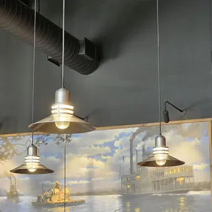 Riverboat mural on back wall