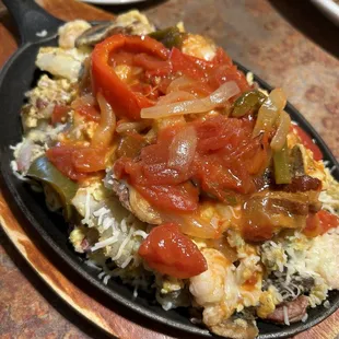 a plate of rice and vegetables
