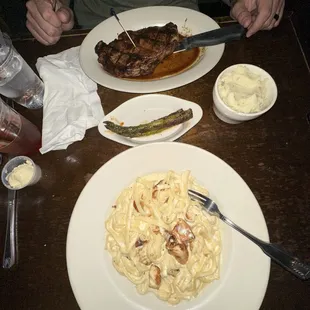 Ribeye and grilled chicken Alfredo