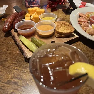 Charcuterie board and a sweet tea cocktail!