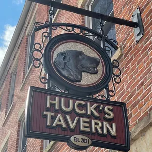 a dog's head on the sign