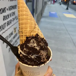 Sea salt and Oreo in a dish with a cone added.