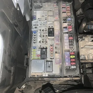 Engine bay was almost spotless but fuse box is cover in dust. FAIL PLAY