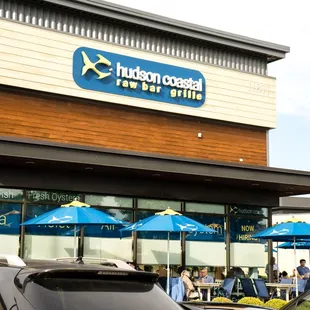 a car parked in front of a restaurant