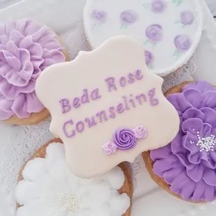 a plate of decorated cookies