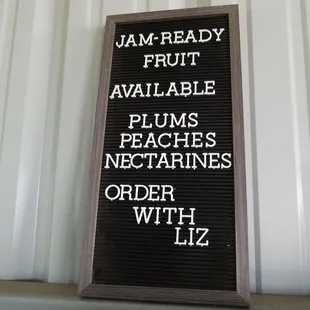 a sign that says jam ready available plums, nectarines, nectarines order with liz