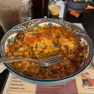 Lasagna oh and I wanted to steal your bowls sooo bad lol. Where did you get them?
