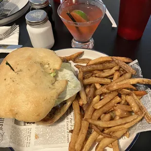 Steak sandwich with fries. And $7.00 adult drink