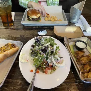 Chili hot dog, house salad with ranch, wings, burger, tater tots.