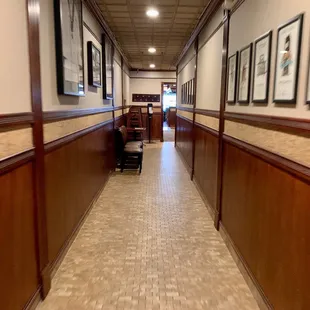 a long hallway leading to the dining room