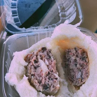 a meatball sandwich in a plastic container