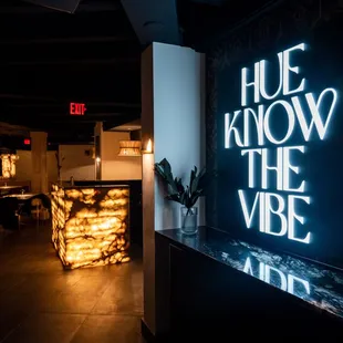 Hue Know The Vibe sign