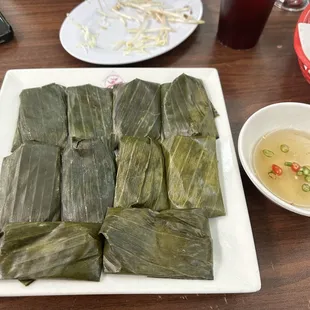 Banh loc la - rice cake with shrimp and pork with fish sauce to dip