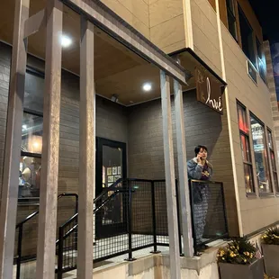 a man on a skateboard in front of a building