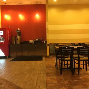 Dining area. Love the Coke machine.