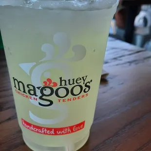 a plastic cup with a straw