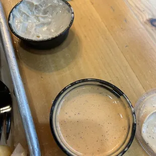 Magoos sauce, and spicy magoos sauce