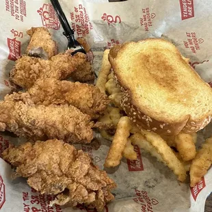 5 piece tender combo, with fries and toast. (Out of picture) Coleslaw on the side with a ice cold coke and their magoo sauce.