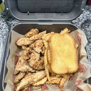 Grilled chicken tenders, fries and Texas toast.