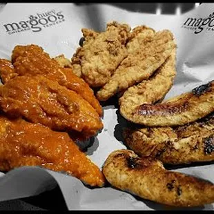 We have the Buffalo sauced fried wings to the left, traditional breaded in the middle and grilled to the right.