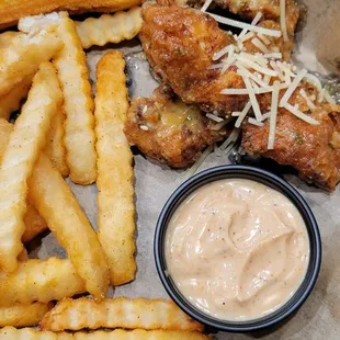 Hand breaded tenders with garlic parmesan