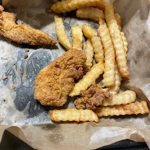 Chicken tender and fries